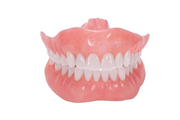 منظور از دندان مصنوعی چسبی چیست؟